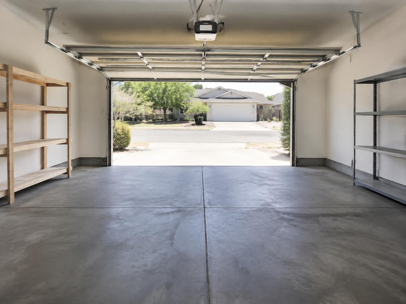 Empty swept garage after a junk removal cleanout